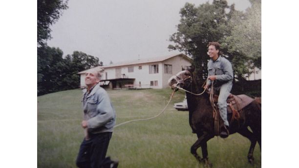 Dad having fun with teenage son!