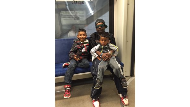 My boys with their dad on the train 