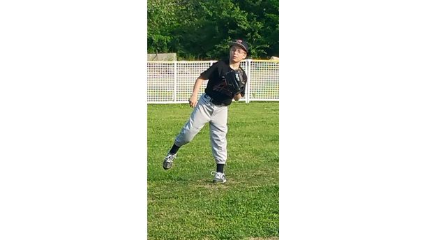 My son playing baseball 